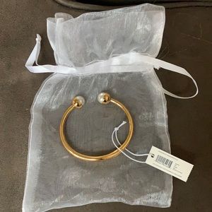 Tory Burch logo hinged bracelet